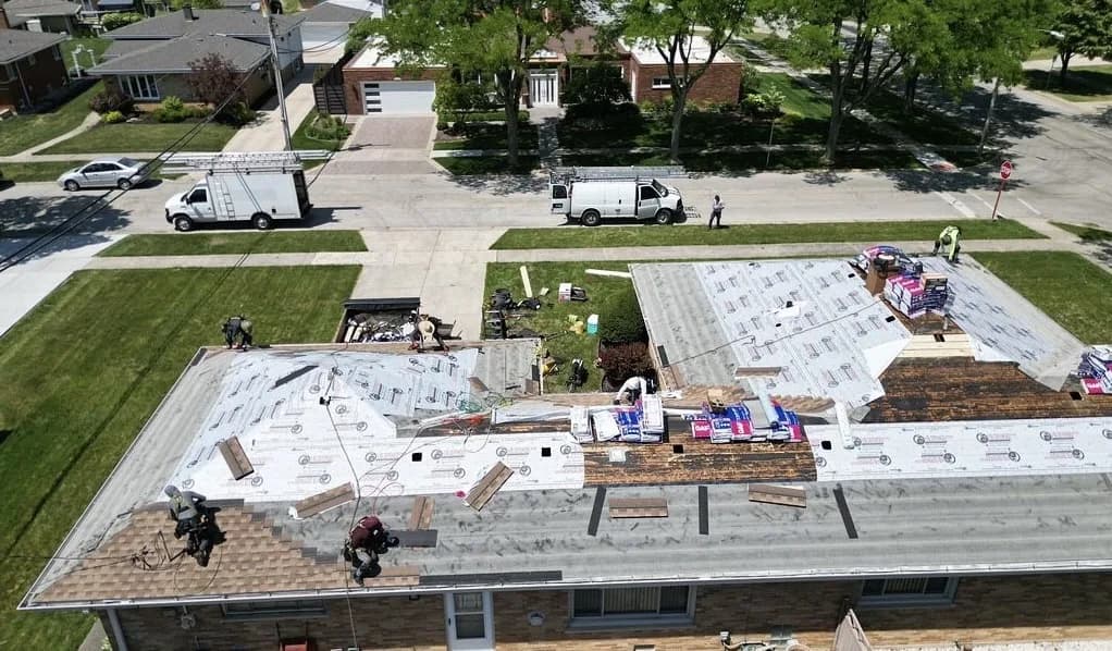 Aerial view of a Heritage Contractors roof replacement installation in progress